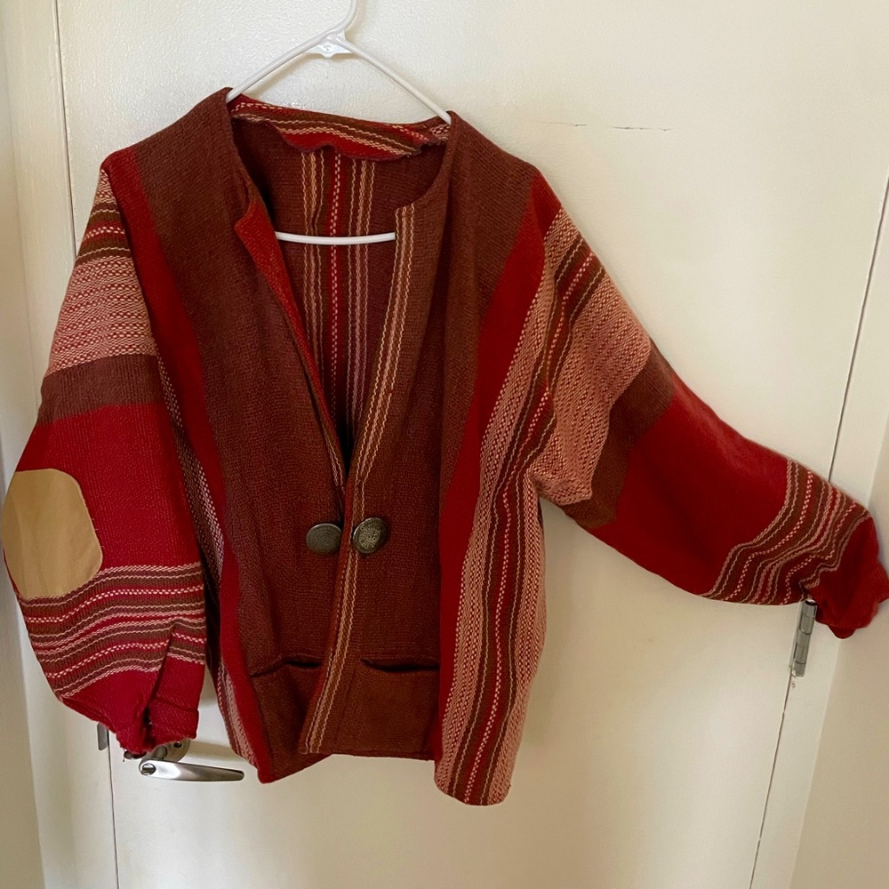 Thrifted 1970s sweater with antique silver buttons.